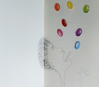 a drawing of a woman blowing colorful bubbles out of her mouth