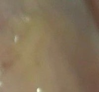 a close up of a person's ear