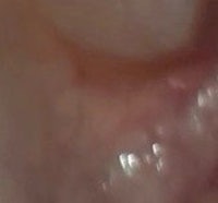 a close up of a person's ear